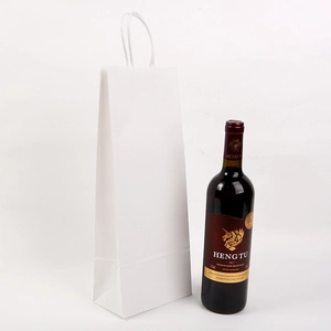 White kraft paper wine bag for single bottle packaging shown with a wine bottle for size