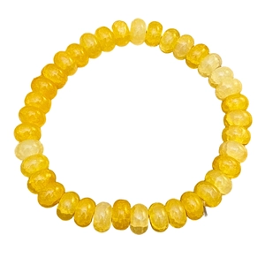 Vue détaillée d'un bracelet en perles jaunes polies avec pierres rondelles et lustre cireux
