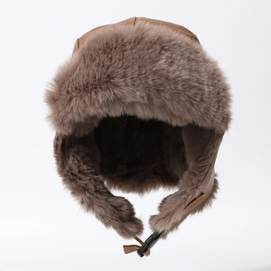 Winter thermal trapper hat in khaki faux leather with thick faux fur lining and ear flaps