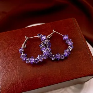 Silver needle hoop earrings with purple geometric rhombic cubic zirconia on leather box