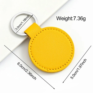 Detail view of yellow PU leather car keychain with precise weight and size dimensions