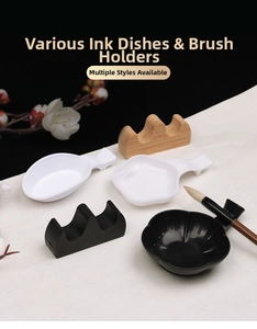Detail of Chinese calligraphy ink dishes and bamboo brush rests in various shapes and styles