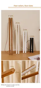 Detail of magnetic wooden poster hanger showing four colors and internal magnet structure