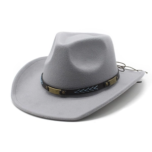 Detail of grey felt cowboy hat with leather band and bronze metal decorations