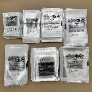 Multiple sizes of clear self-adhesive plastic bags with multi-language warning labels