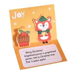 3D pop-up Christmas card featuring cartoon fox and JOY cutout on ginger background