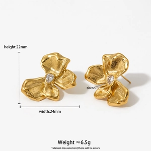 Elegant gold butterfly flower earrings with zircon inlays and textured metal finish