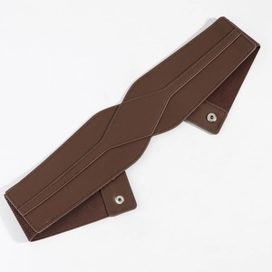Detailed view of brown PU leather elastic waist belt with metal snap button closures