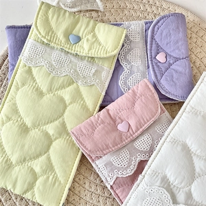 Quilted heart sunglasses pouch with delicate lace trim and heart shaped button closure