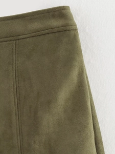 Detailed close-up of army green faux suede fabric with precise double stitching on the waist
