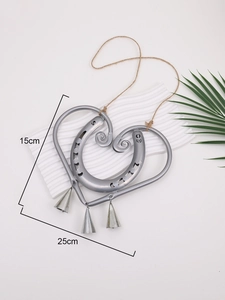 Lucky Love horseshoe heart metal wall decor with wind chime bells and rustic twine