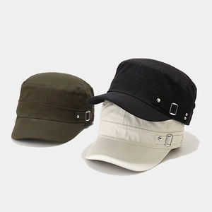 Flat top military caps in black, army green, and beige with side buckle and rivet details