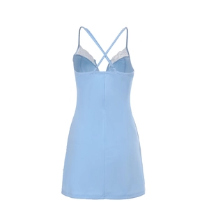 Detail of light blue mini dress featuring cross-back straps and white lace trim V-neckline