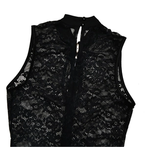 Detail of floral lace back featuring high neck buttons and a concealed zipper