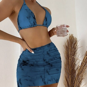 Three-piece marble print bikini set with ruched skirt in cobalt blue and black design