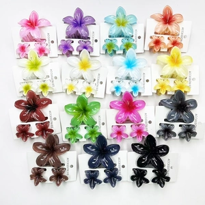 Plumeria hair claw clip set with marble flower design in assorted colors for styling