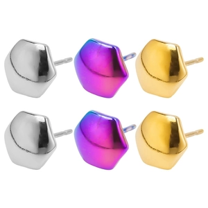 Detail view of hexagonal stainless steel stud earrings in silver, gold, and rainbow finishes