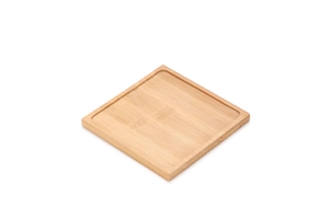 Top-down shot of a square bamboo tray with natural grain and raised edges on white background