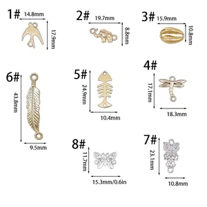 Size chart showing dimensions for vintage alloy charms including swallow, fishbone, and butterfly
