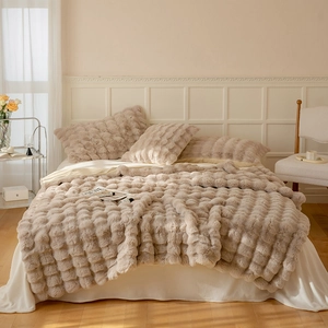 Detailed macro view of the premium double-layer faux rabbit fur blanket texture