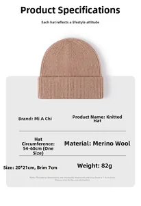 Detailed close-up of thick sheep cashmere knit texture and 7cm folded brim on beige beanie
