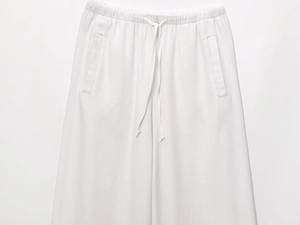 Détails du pantalon de jogging blanc en coton avec taille élastiquée et cordon serrage