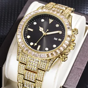 Luxury gold iced-out quartz watch with emerald sunray dial and baguette diamond bezel