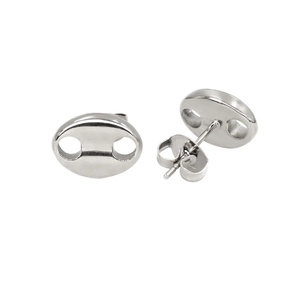 Detailed view of polished silver coffee bean stud earrings with butterfly backings