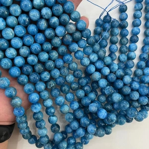 Natural blue lapis lazuli round loose beads for DIY jewelry making hand-held display