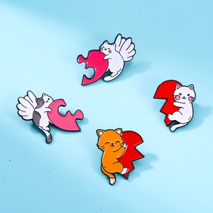 Set of four cute cartoon cat enamel pins holding heart puzzle pieces on blue background