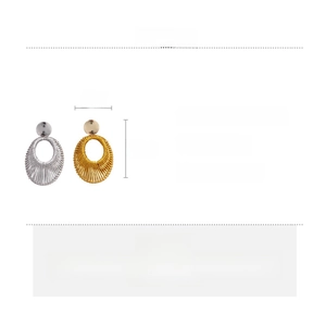 Detail view of woven gold velvet oval earrings with dimensions and material specs
