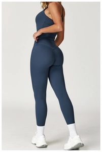 Detailed back view of navy blue high-waist yoga set with V-shaped lifting seam