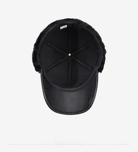 Detail view of thickened black fleece lining and faux leather brim of the winter earflaps hat