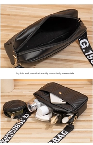 Detail of black quilted crossbody bag with coin purse showing interior storage space