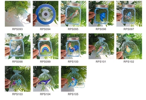 Collage of 13 rainbow prism window films featuring colorful marine life and ocean animals
