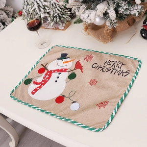 Christmas snowman embroidered table mat with Merry Christmas text and red bird motifs