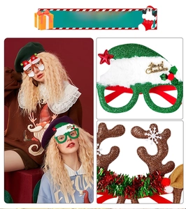 Close-up of glittery reindeer antlers and Christmas hat glasses for holiday party