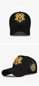 Detailansicht der Trucker-Mütze in Schwarz-Gelb mit goldener Stickerei und atmungsaktivem Netz
