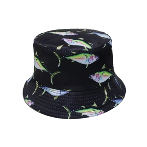 Close-up of black bucket hat featuring realistic colorful fish print and canvas texture