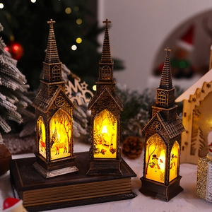 Macro detail of bronze Christmas lanterns with warm LED light and festive silhouettes
