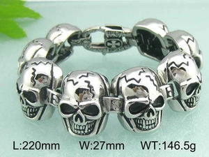 Detail of silver skull link bracelet with size dimensions 220mm length and 27mm width