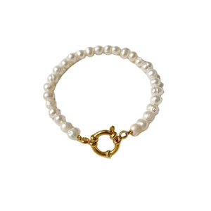 Elegant baroque freshwater pearl bracelet with a golden sailor spring clasp closure