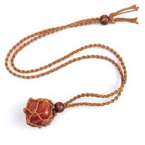 Handmade woven mesh necklace featuring raw red natural stone pendant and adjustable cord