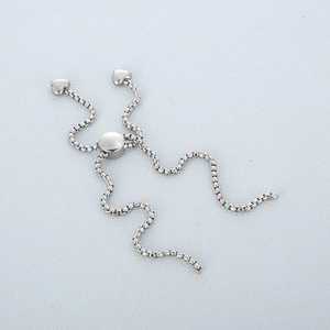 Silver snake chain bracelet with adjustable sliding clasp and twin heart charms