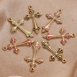 Baroque retro cross pendants with enamel inlay and rhinestones on champagne satin