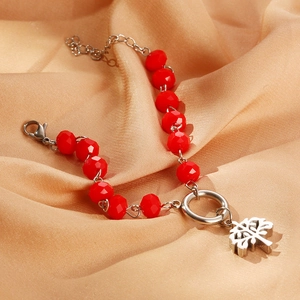Fashion tree of life charm bracelet featuring red faceted beads and silver metal chain