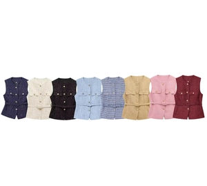 Detail showing various colors of tweed vests with metal buttons and matching belts