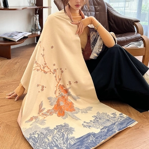 Detail of soft beige cashmere shawl with blue landscape and orange floral pattern