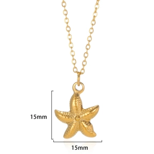 Macro detail of 15mm gold starfish pendant with textured surface and fine O-chain
