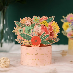 3D pop-up floral greeting card with pink flower bouquet and gold Best Wishes text